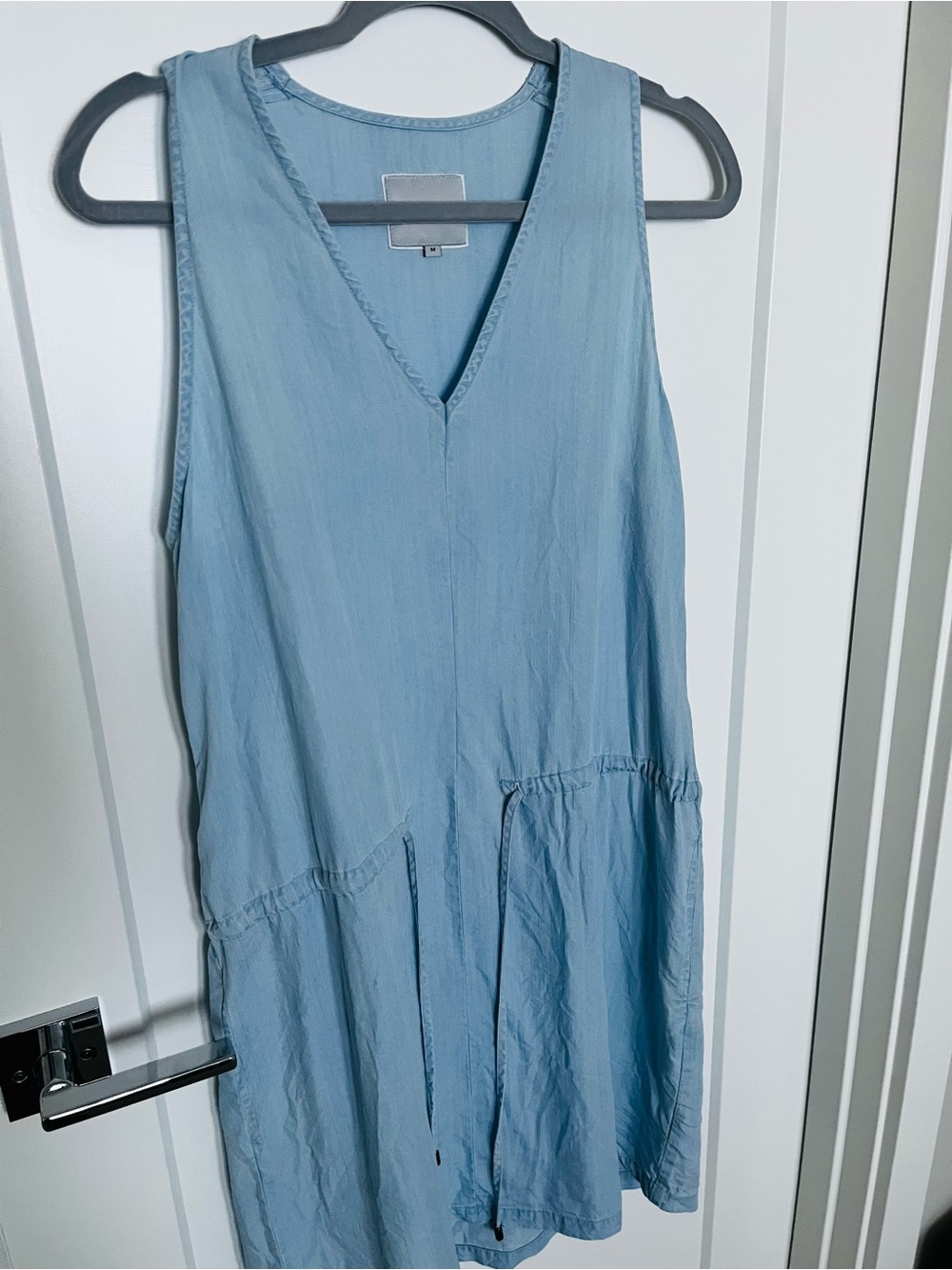 V-neck light blue top